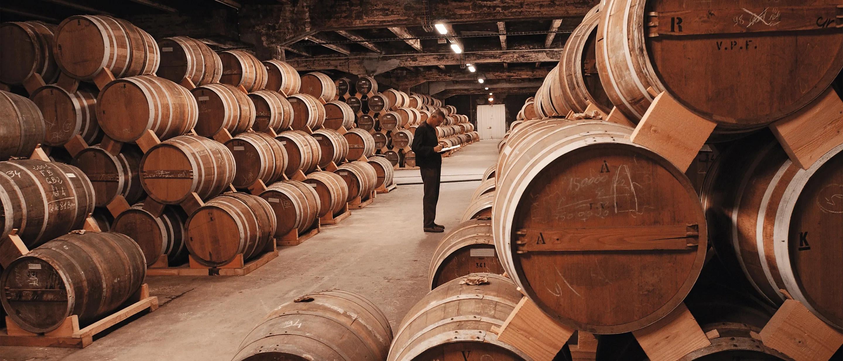 Barrels in the cellar at Maison Martell, in Cognac, France.
