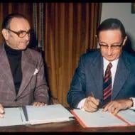 Paul Ricard and Jean Hemard sign a contract at the creation of Pernod Ricard in 1975.